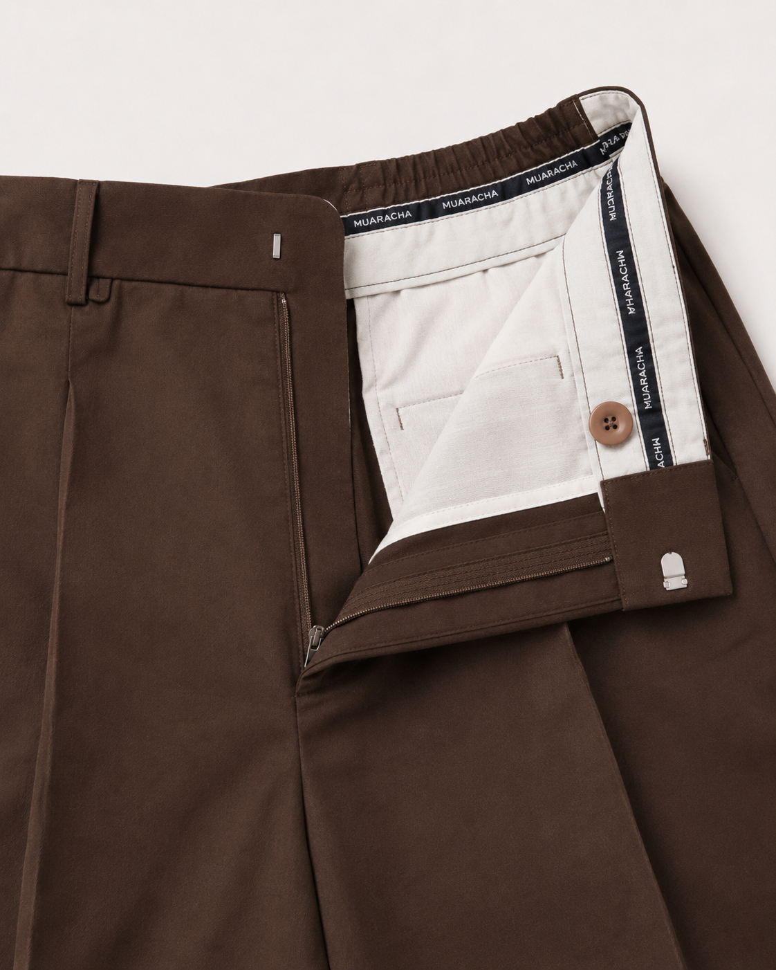 MUARACHA Relaxed Trouser Cacao Brown — wide-leg tailored silhouette, premium fabric, relaxed fit