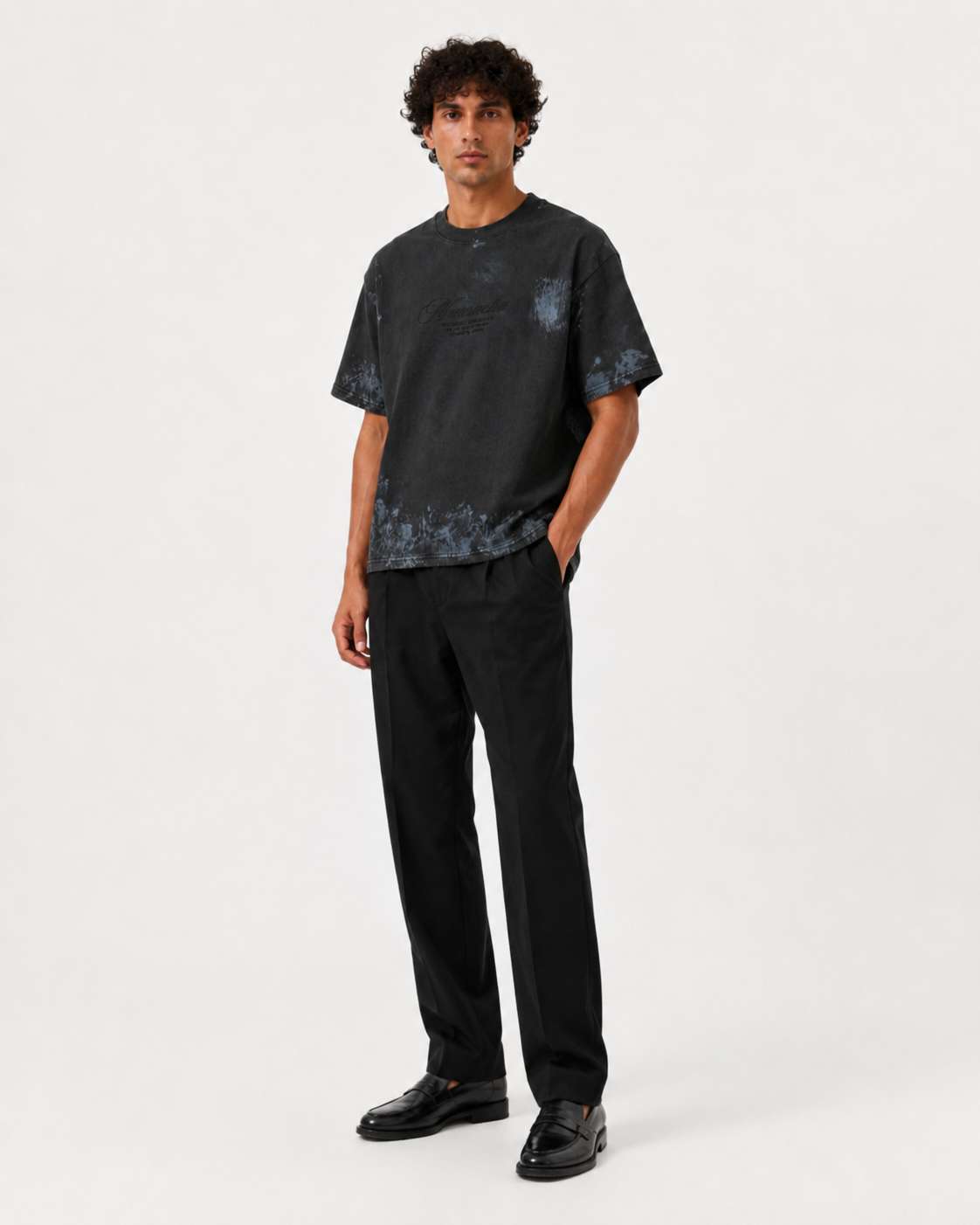 MUARACHA Script Tee Black Stone Washed — three-quarter view, washed black finish